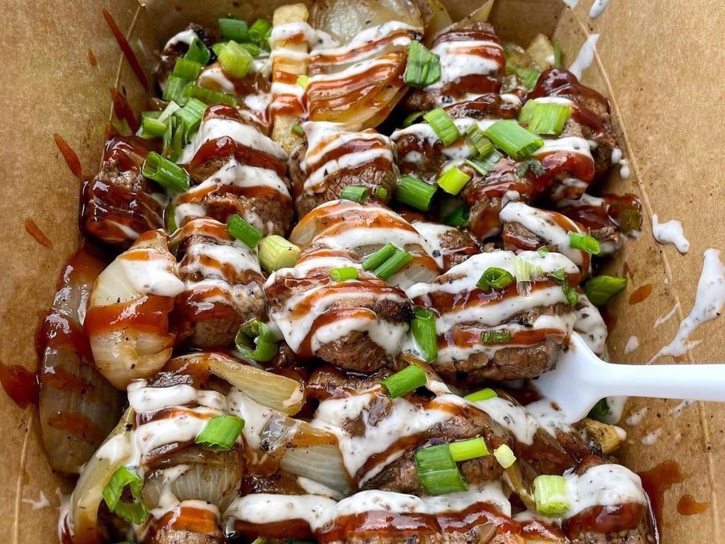 Steak Box with grilled steak and caramelized onions